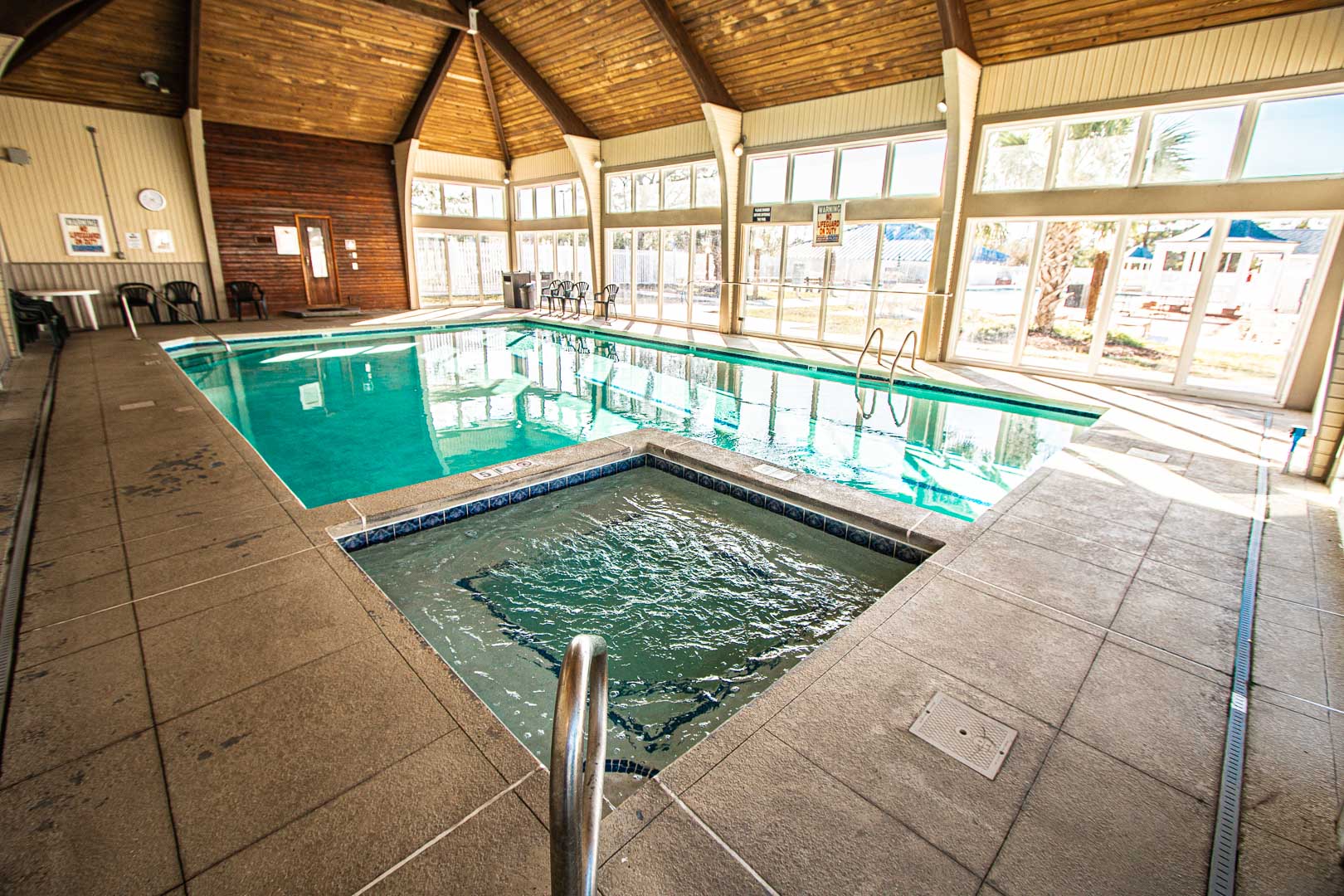 A stoic indoor swimming pool and Jacuzzi tub at VRI's Harbourside II in New Bern, North Carolina.